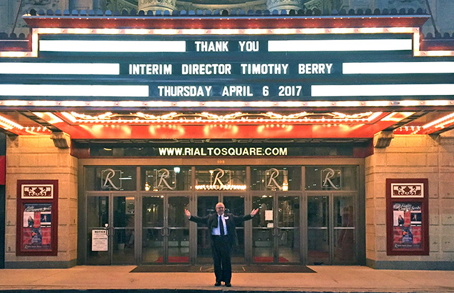 Tim Berry in front of an event he organized.